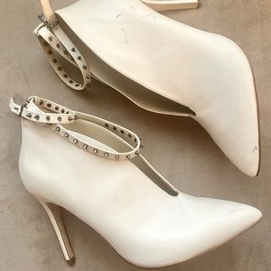 Ms.Jessica Simpson cream booties with spike decor.  Wraps around the ankle.